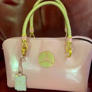 Mercedes Benz purse Powder Pink/Gold hardware.  Free key ring and shipping